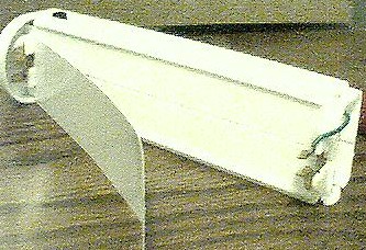 Photo of peeling the adhesive insert.